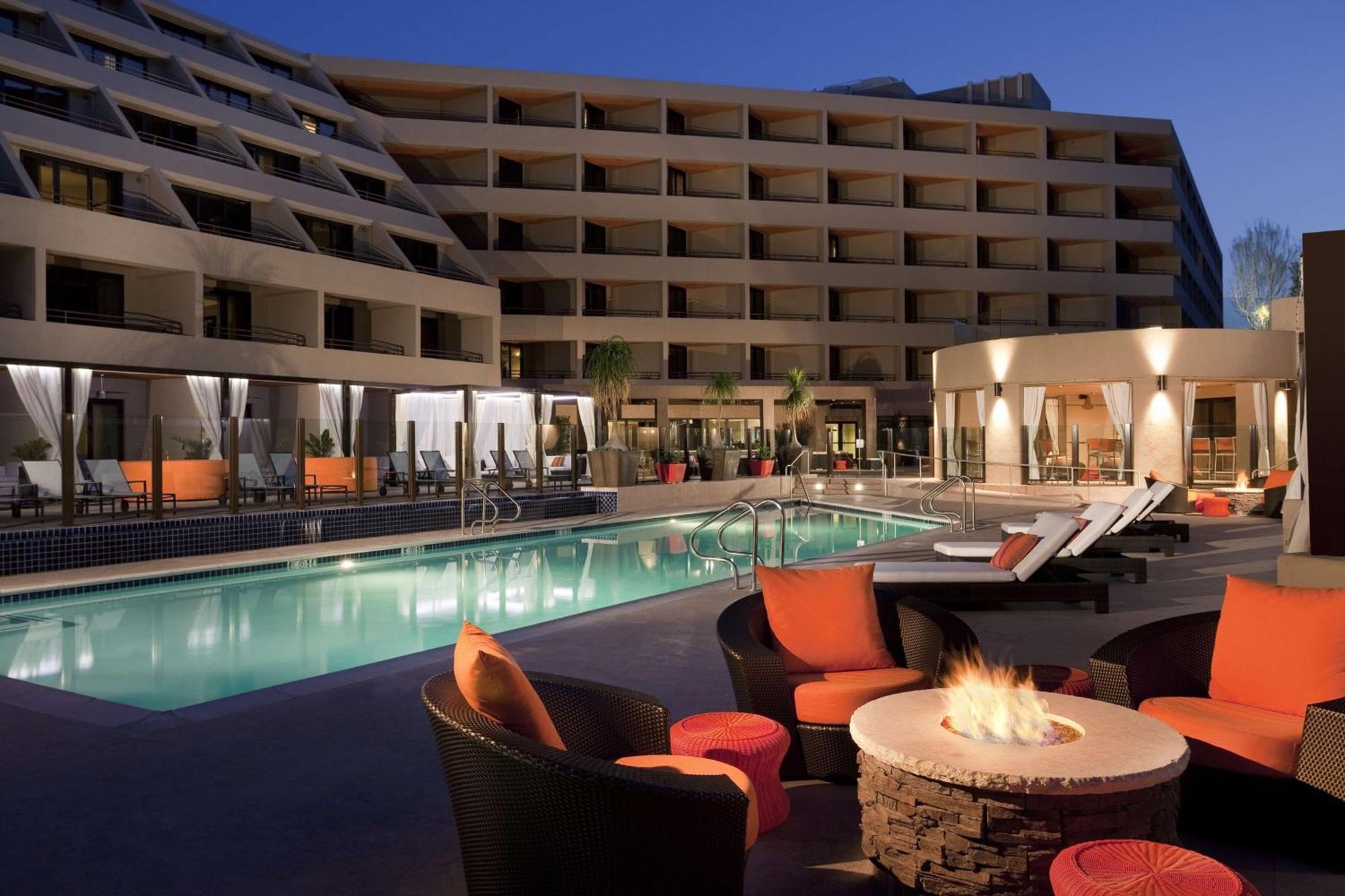 The hotel pool at dusk as it is today